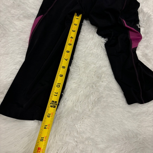 PEARL iZUMi Women's Sugar Cycling 3/4 Tight, Black/Purple Wine Padded Large - Picture 9 of 15